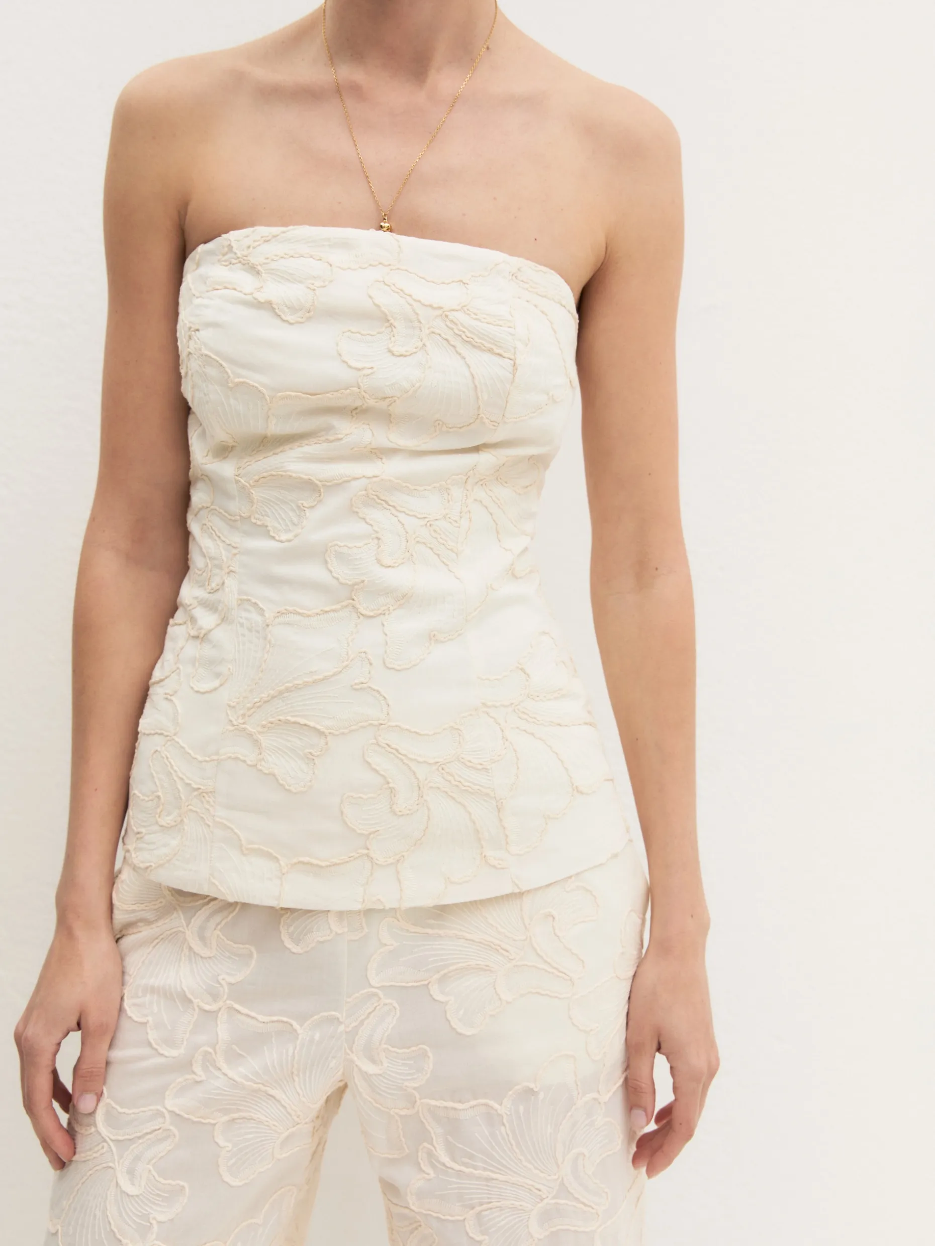 Top a bustier con ricami - PANNA